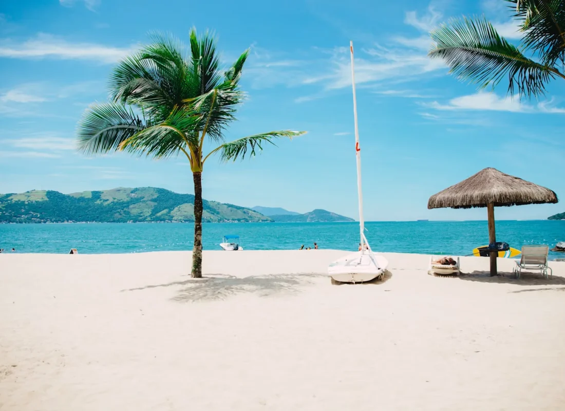 Pristine White-Sand Beaches Powder-soft shores framed by swaying palms.